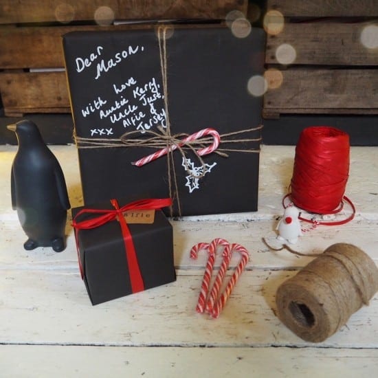 Stylish Christmas gift wrapping ideas, chalkboard paper, red ribbon