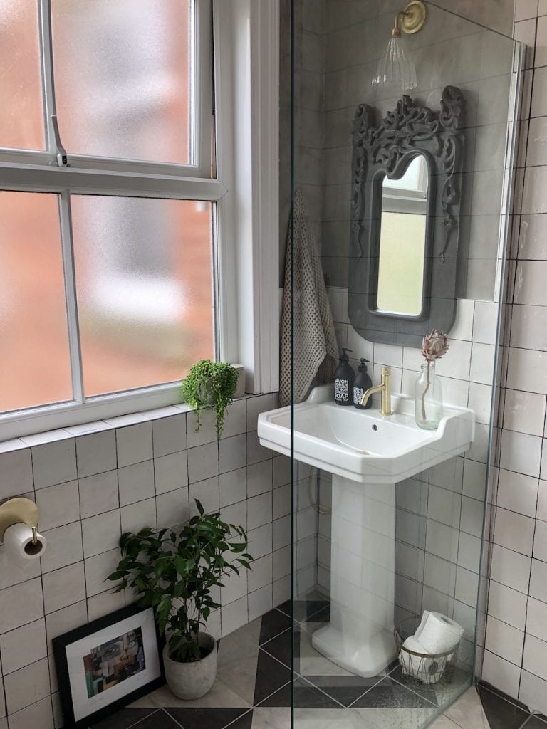 Rented house, renovation, traditional basin, mirror, brass wall light